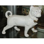 A late 19th Century Continental bisque model of a standing dog, possibly a mastiff.