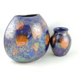 A Poole Pottery Metallic Galaxy Purse vase, with purple iridescent glaze, H.