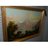 Late 19th / early 20th century Continental school, a mountainous lake scene, oil on canvas,