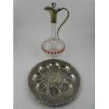 A white metal mounted Bohemian glass jug, together with one Indian white metal tray. D.