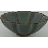 A celedon bowl of lotus leaf form, D. 13cm.