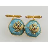 A pair of gilt cufflinks, stamped 925,