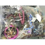 A large quantity of assorted costume jewellery.