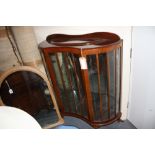 A 1950s walnut display cabinet, W. 106cm.