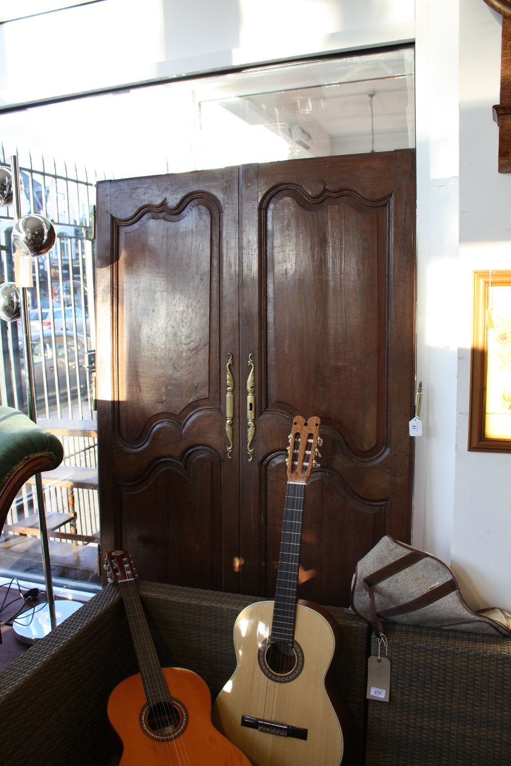 A pair of late 18th/early 19th Century French provincial oak armoire doors of twin panel