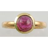 A pink tourmaline dress ring, set in a 22ct gold band, 5.5g.
