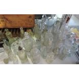 A quantity of assorted Victorian and later glass apothecary and cruet bottles and jars.