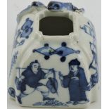 A blue and white water pot, of square form decorated with figures and applied with a lizard,