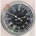 A vintage style chrome cased wall clock, the circular black dial marked roman numerals, Dia. 42cm.