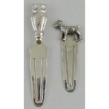 Two silver pace markers with cast owl and goat decoration.