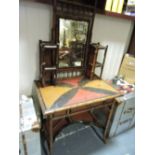 A late Victorian lacquer and bamboo dressing table with rectangular swing mirror back over frieze