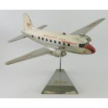 A 1950s painted wood scale model of a BEA Vickers Viking passenger aircraft on triangular stand