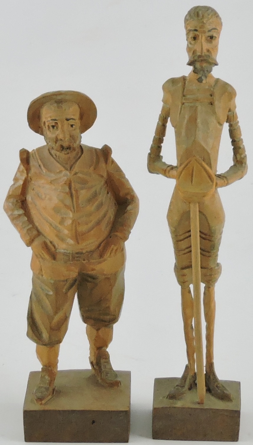 A pair of late 19th Century German carved hardwood figures, Don Quixote and Snacho Panza, H.