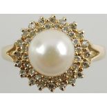 A pearl and diamond dress ring,