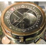 An Air Ministry brass aeronautical compass.