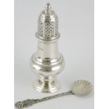 A silver baluster shaped sugar sifter, London 1900, 2.