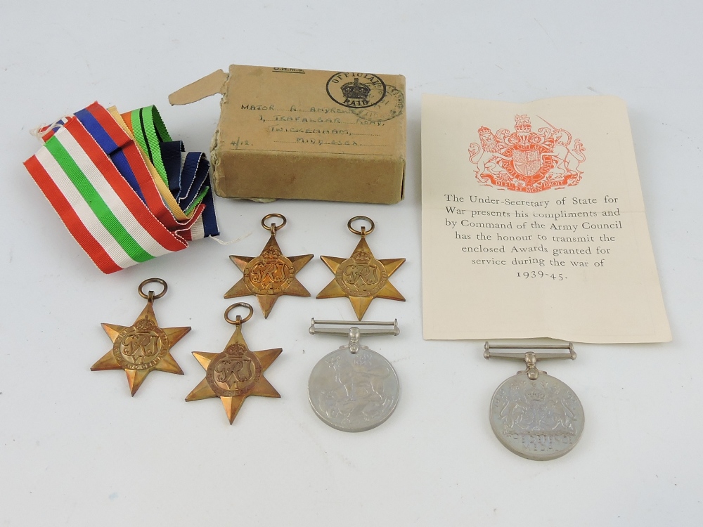 A group of six Second War medals comprising service medal and defence medal, Africa star,