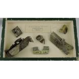 A box framed display of six Zeppelin fragments salvaged from the wreckage of the SLII Cuffley