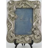 An early 20th Century rectangular Chinese white metal photograph frame,