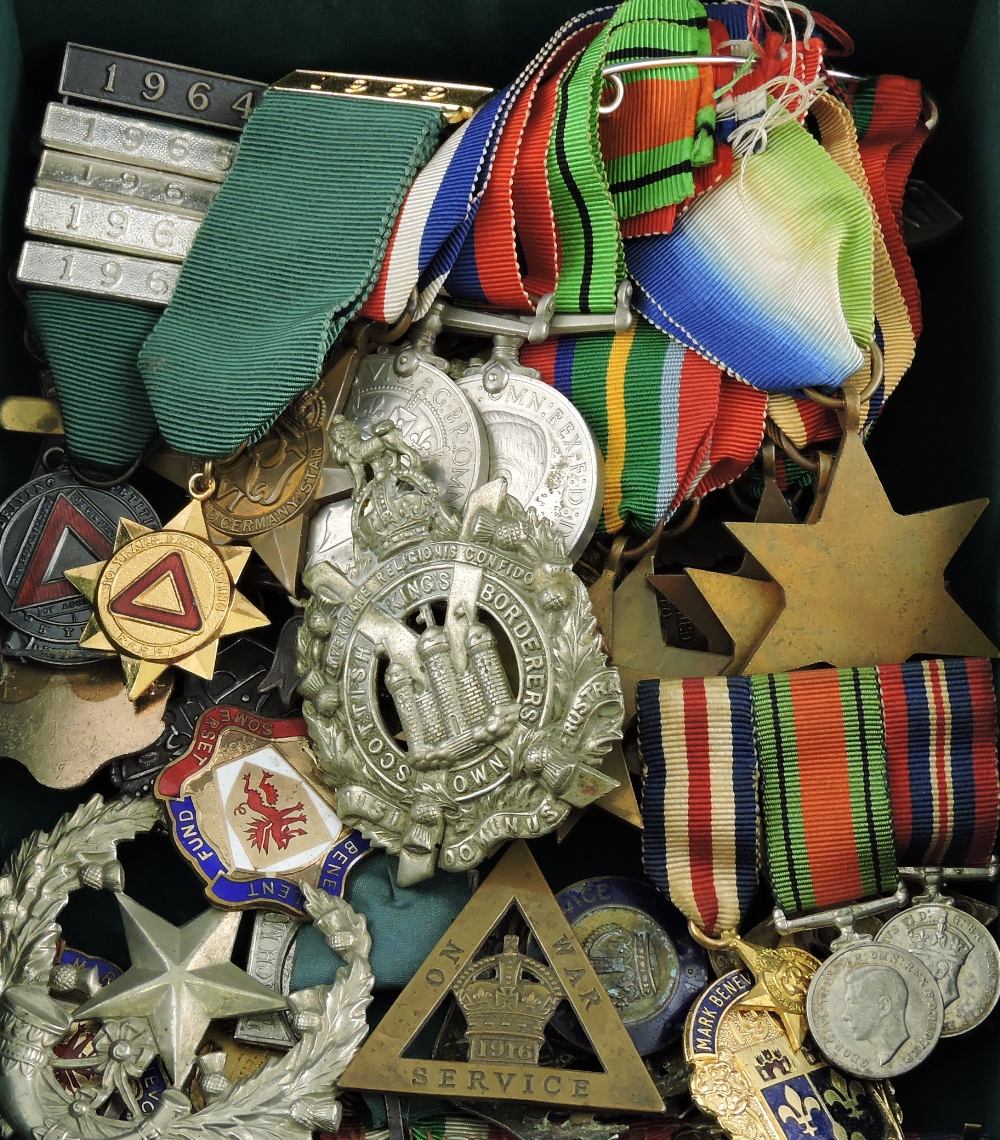 A collection of WWII medals, including Burma, Africa, Italy, Atlantic,