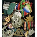 A collection of WWII medals, including Burma, Africa, Italy, Atlantic,