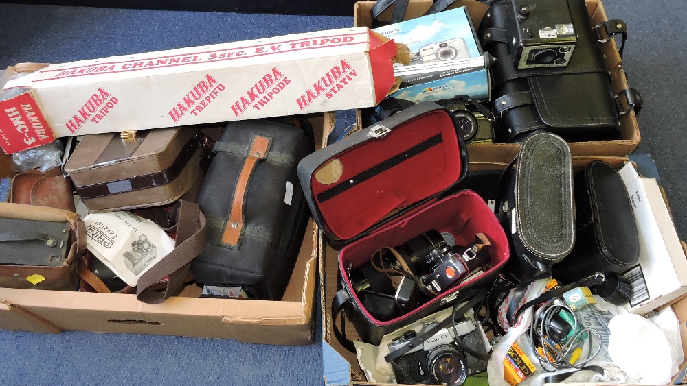 A quantity of cameras and accessories including various 35mm examples, 8mm cine,