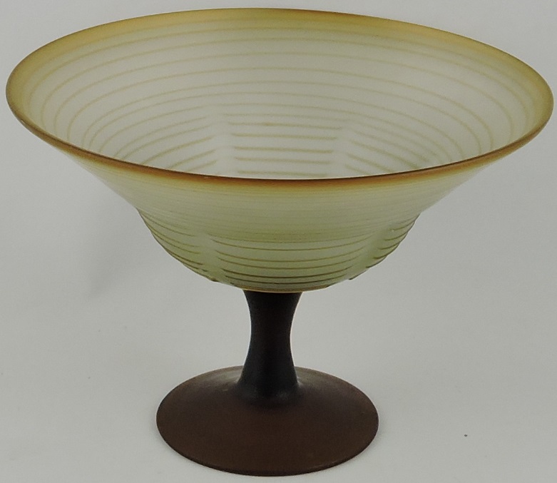 A caramel frost glass bowl, raised on a circular pedastal and foot, D. 28.