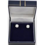 A pair of 18ct white gold screw back multi cluster diamond ear studs, total 0.34ct.