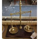 A pair of early 20th century brass balance scale,