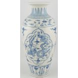 A baluster form blue and white vase, decorated with vignettes of dragons and phoenix between clouds,