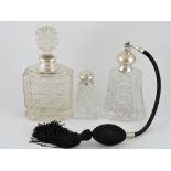 A cut glass and silver mounted perfume bottle, London 1930,