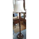 Wooden turned floor lamp with shade