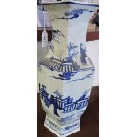 A Chinese blue and white hexagonal pottery vase decorated with figures, H. 45cm.