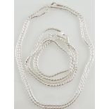 A heavy link white metal chain, stamped 925, together with three other similar, 5.5g.