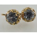 A pair of gilt and blue stone set earrings, stamped 9ct, 5g.