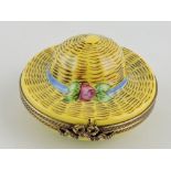 A limoges porcelain box modelled as a ladies straw bonnet with smaller inside.