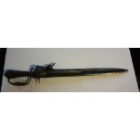 After the antique, a reproduction small sword combined flintock pistol with wood grip, L 62cm.