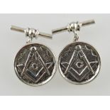 A pair of circular silver chain and bar cufflinks embossed masonic symbols.