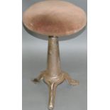 An early 20th Century Singer style industrial steel stool with revolving adjustable seat on tripod