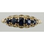 An early 20th century sapphire and diamond set ring,