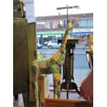 A patchwork painted metal model giraffe. H. 120cm.