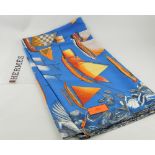 An Hermes 'Tous Les Bateaux du Monde', silk scarf, blue and gold colourway.