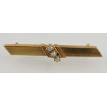 A late Victorian/Edwardian style 18ct yellow gold and seed pearl bar brooch, 3.8g gross.