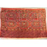 A late 19th/early 20th Century Afghan bokhata red ground saddle bag face,