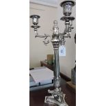 A pair of empire design plated three branch candelabra with scroll branches on fluted columns and