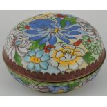 A circular cloisonne lidded box, with stylised floral design,