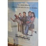 A framed French film poster for Michael Keaton's 'Multiplicity'
