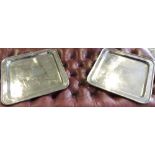 A pair of plated square trays each engraved central armorial.