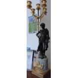 A pair of Regency design bronze and ormolu candelabra each with five sconces on coiled serpent arms