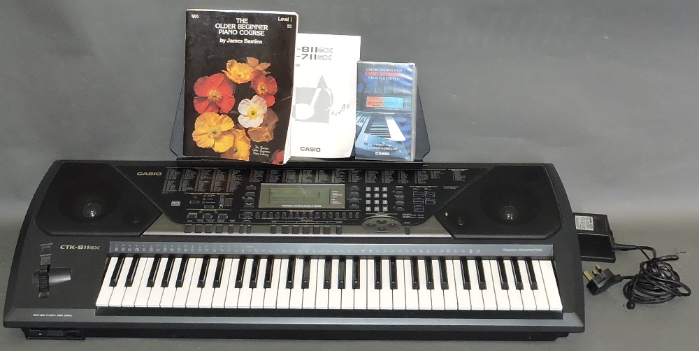 A Casio CTK 811 electronic organ.